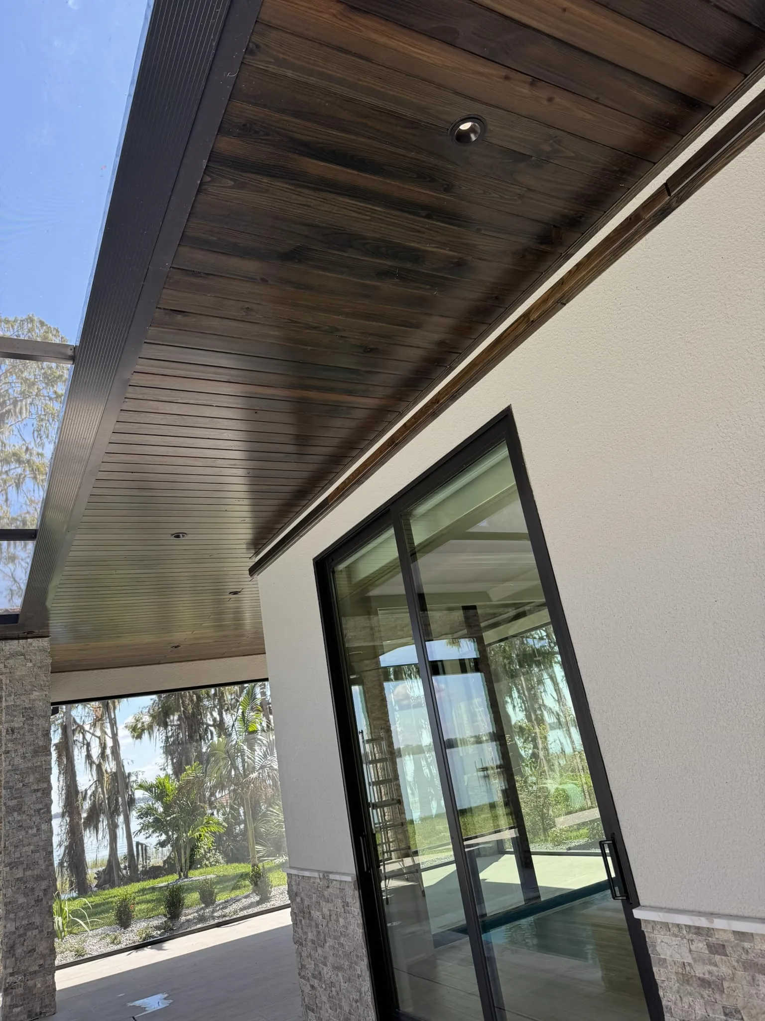 Residential exterior with updated stucco and trim
