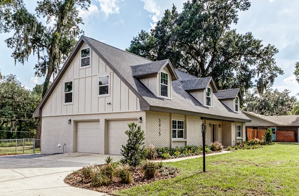 Modern Florida home with light exterior finish and siding details