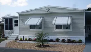Updated residential entry with coordinated exterior siding and trim